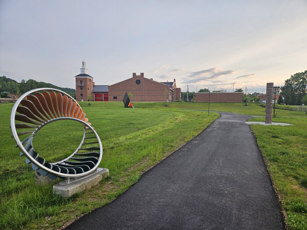 Art walk with the new Stimson fire station headquarters in the background.