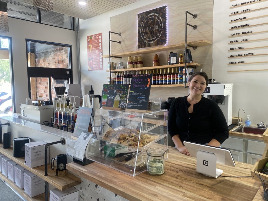 Jenna Dolan behind the counter at Dirty Girl coffee