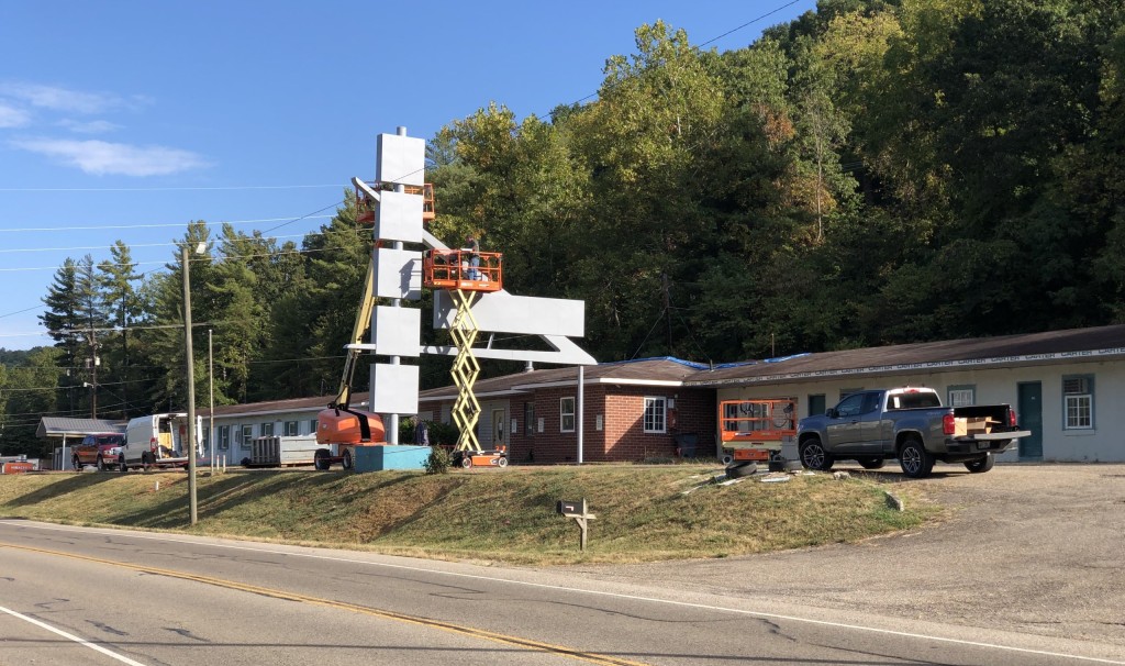 Outside of former Sunset Motel, sign painted