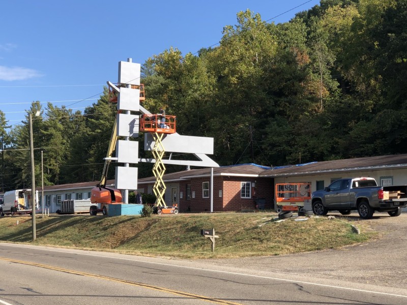 Outside of former Sunset Motel, sign painted