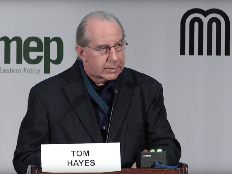 A man stands at a podium.