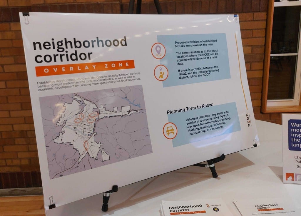 A photo of a poster board at a public meeting.