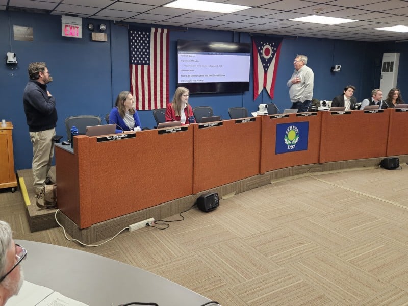 Paul Isherwood and Alan Swank saying the Pledge of Allegiance.